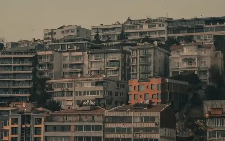 Apartment blocks lining a hillside